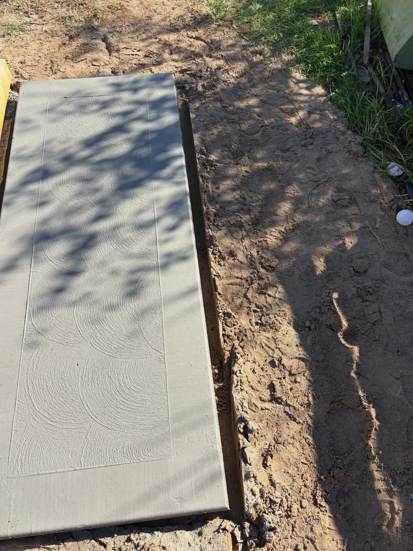 The separate smoker pad on the Padbury job, poured and swirl-floated